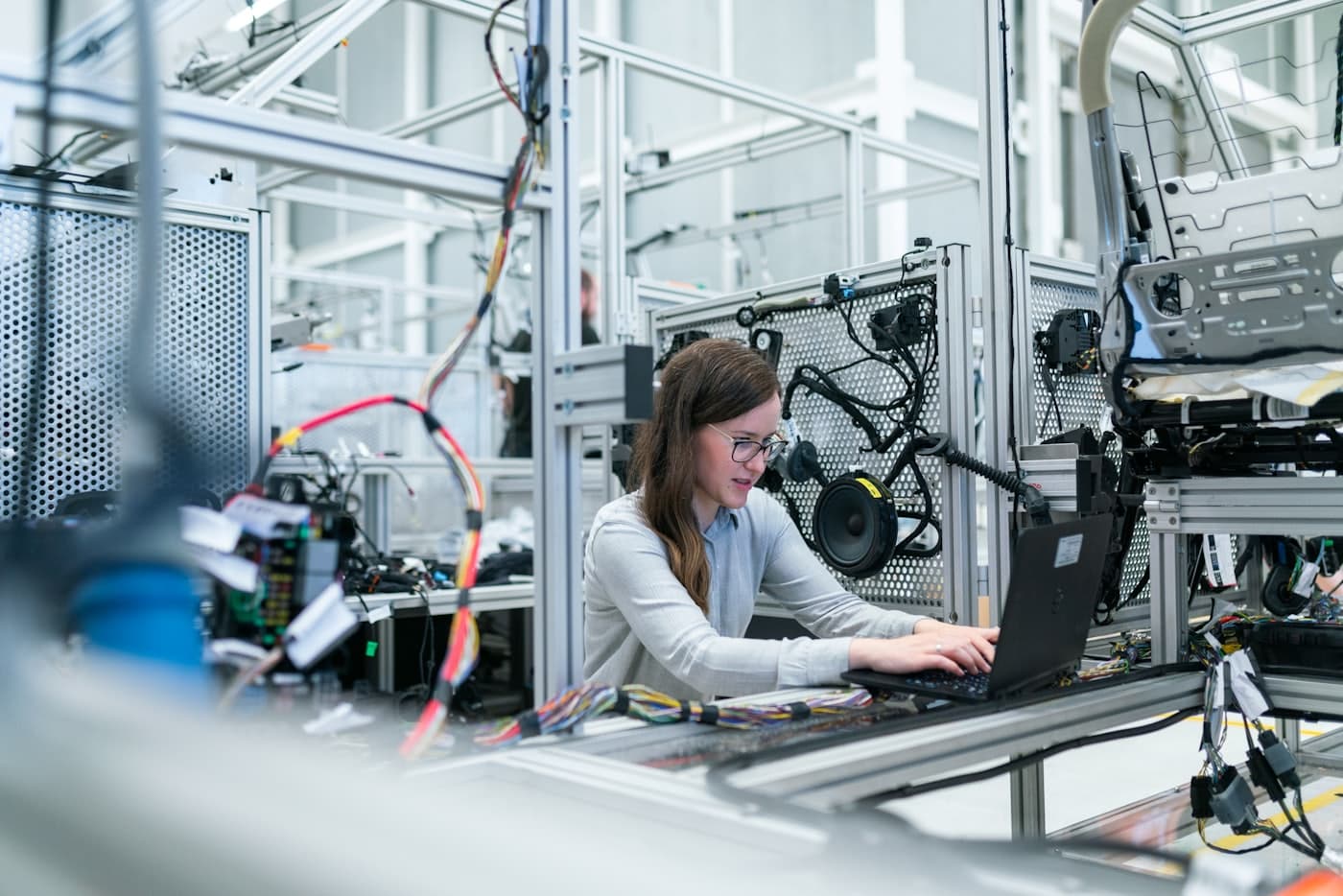 An operator working at a workstation in a fulfilment facility